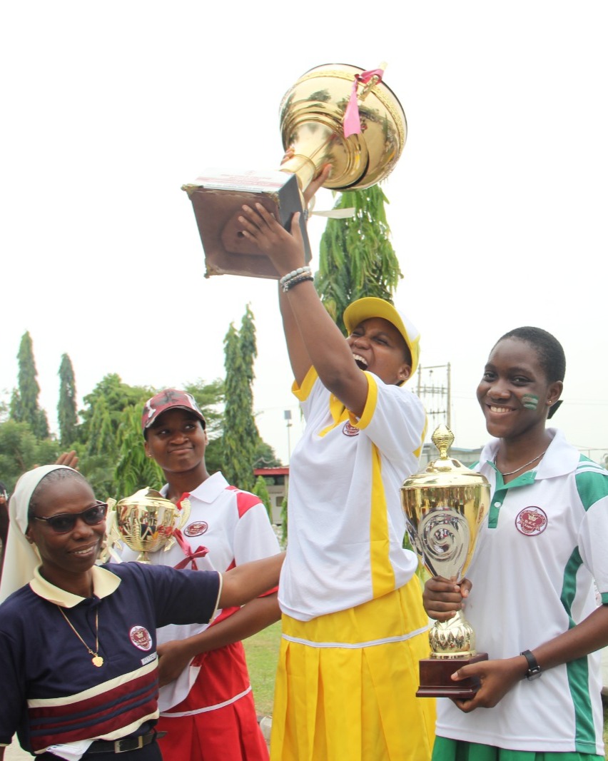Students with trophies